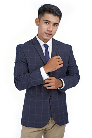 Asian handsome young business man isolated on white background with copy spaceの写真素材