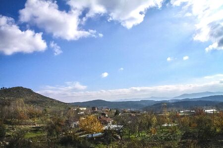 A small village, blue sky, the beginning of spring