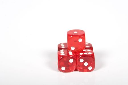 Red and white dice on a white backgroundの写真素材
