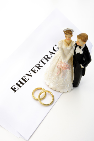 Wedding couples figurines standing on magisterial form textの写真素材