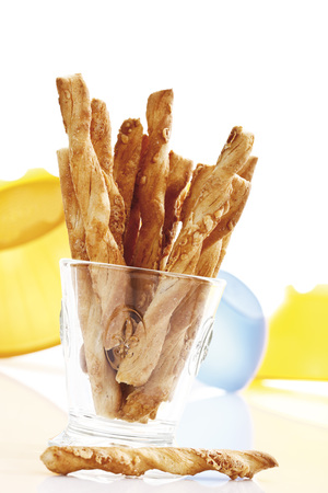 Cheese straws in glassの写真素材