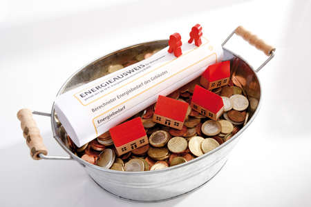 Pawns, Energy pass and pot with Euro coinsの写真素材
