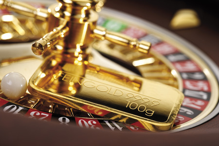 Gold bar on roulette wheelの写真素材