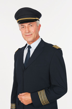 Close up of senior flight captain on white background