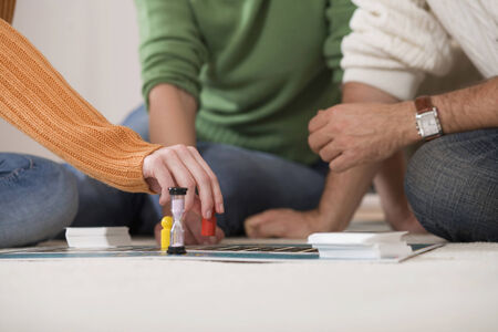 Family playing board game