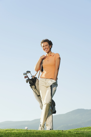 Italy, Kastelruth, Man on golf course smilingの写真素材