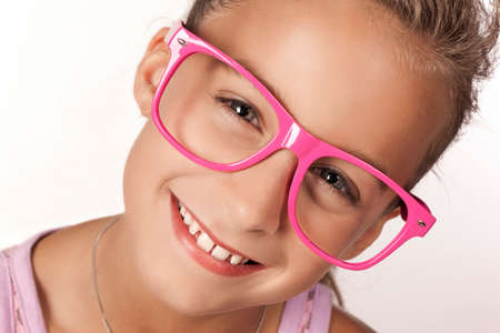 Portrait of blonde girl wearing huge eyeglass rim
