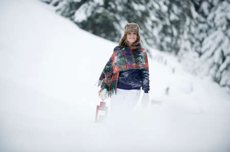 Austria, Altenmarkt, Young woman walking with Lanternの写真素材