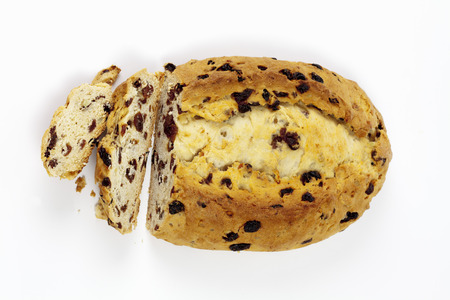 Homemade stollen on white background elevated view