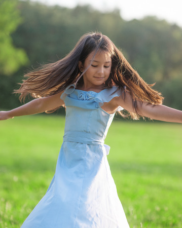 Little girl wearing communion dressの写真素材