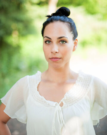 Portrait of a pretty black haired womanの写真素材