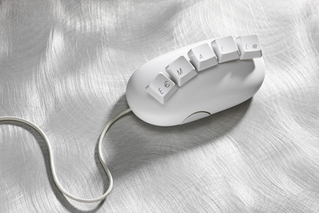 Computer keyboard keys on computer mouse, elevated view