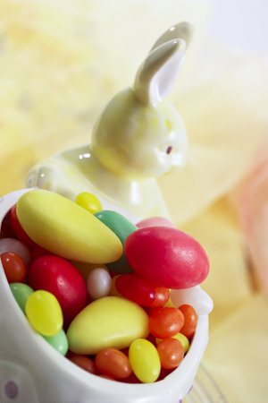 Easter bunny figure with sugar easter eggsの写真素材