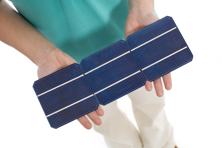 Woman holding solar cell