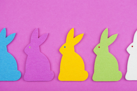 Easter decoration, Felt Easter bunnies on pink backgroundの写真素材