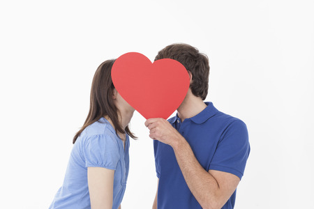 Couple with red heart shapeの写真素材