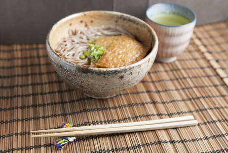 Kitsune soba, Japanese buckwheat noodles with marinated, fried tofuの写真素材