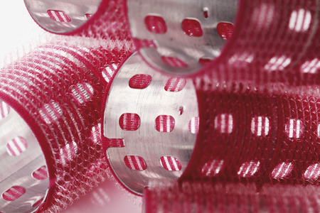 Close up of red bur curlersの写真素材