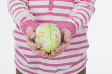 Girl with easter eggの写真素材