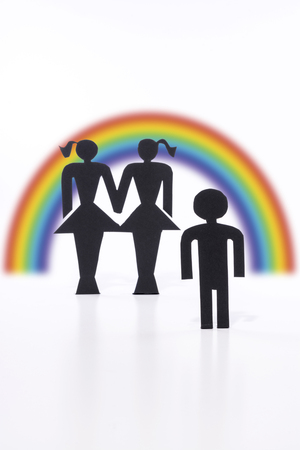 Homosexual couple with child, figurines, same-sex marriage, wish for childの写真素材