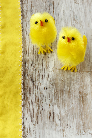Eastern, chick figurines on wood, Easter cardの写真素材