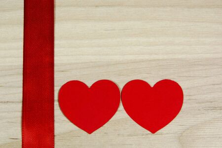 Red hearts with ribbon
