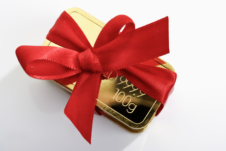 Gold bar with red ribbon