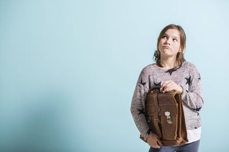 Young girl looking thoughtfulの写真素材