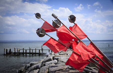 Germany, Rugen, Baltic Sea, red buoy flags