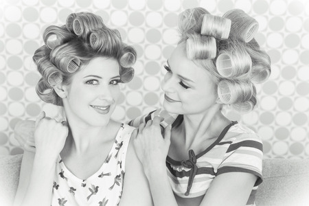 Young women with curlersの写真素材