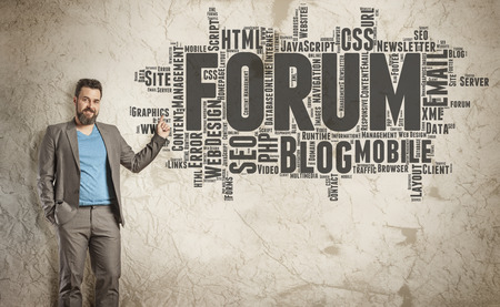 Forum Word Cloud on Grunge Wall, Business Man as Presenter