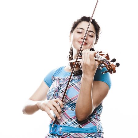 Emotional young violinist playing musicの写真素材