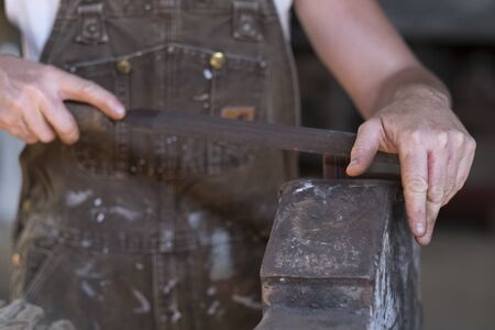 Female Welder in a Metal Shopの写真素材