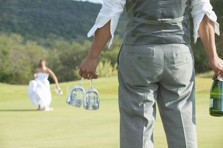 Bride andgroom drinking champagneの写真素材