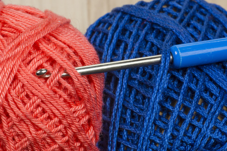 Balls of wool with crocheting hookの写真素材