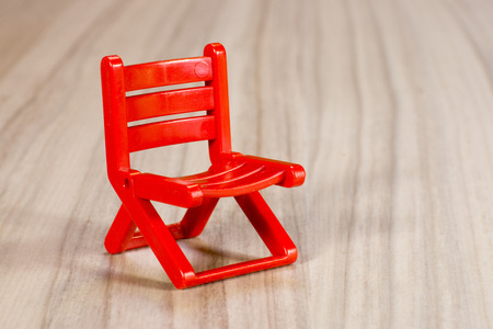 Empty red chair on woodの写真素材