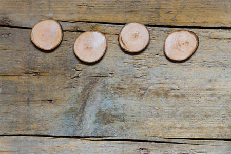 Blank wooden slices on woodの写真素材