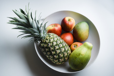 Fruits in a big white bowlの写真素材