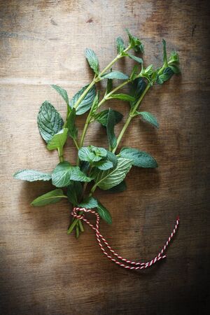 Fresh pepper mint on woodの写真素材