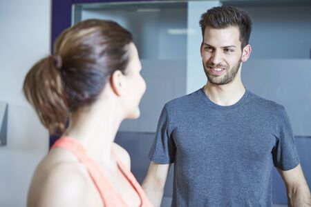 Couple training in fitness studioの写真素材