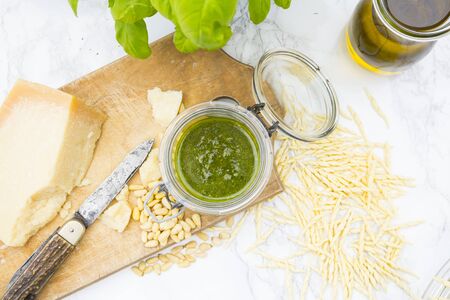 Pesto alla genovese, basil, parmesan, pine-nuts, olive oil and trofie-noodlesの写真素材