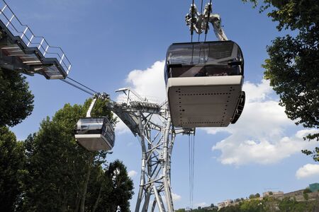 Germany, North Rhine-Westphalia, Koblenz, View of cable cars moving through mountains