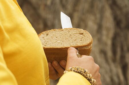 Austria, Salzburger Land, slicing bread