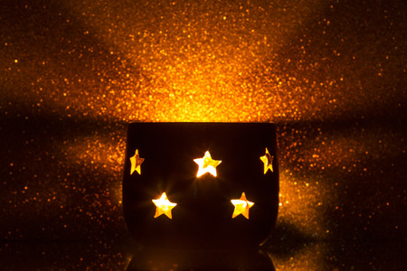 Tea light holder with starsの写真素材