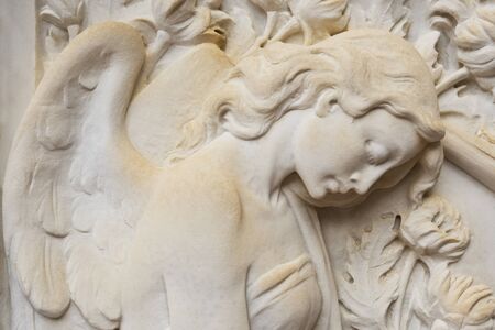 Italy, relief of angel, marbleの写真素材