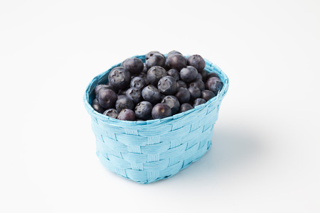Blueberries in basketの写真素材