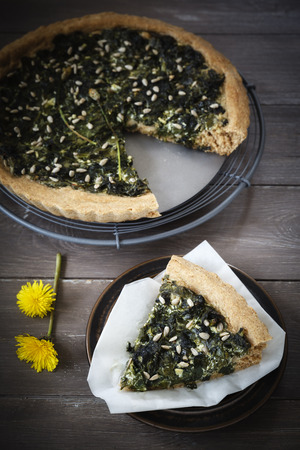 Wild herb spinach quiche, vegetarian, cooling gridの写真素材