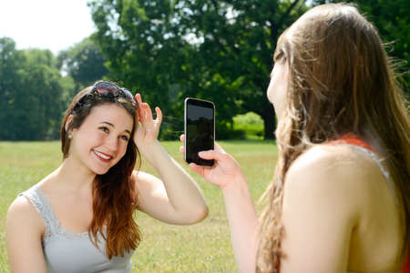 Girlfriends with smartphone, Selfie