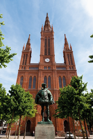Germany,Hesse,Wiesbaden,View of Cathedral Marktkirche with statue of William I in foregroundのeditorial素材