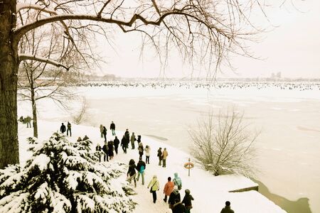 Germany, Hamburg, ice covered Aussenalster during winterの写真素材